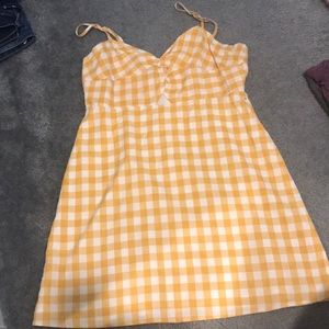yellow and white picnic print dress